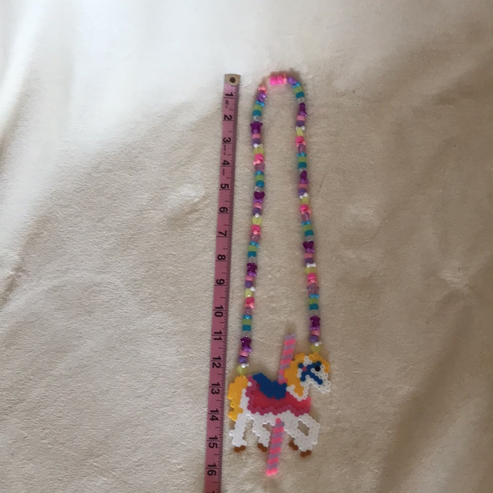 iHeartRaves Carousel Horse Toy Necklace — OS, NWT (Kawaii/Y2K) - Picture 4 of 4